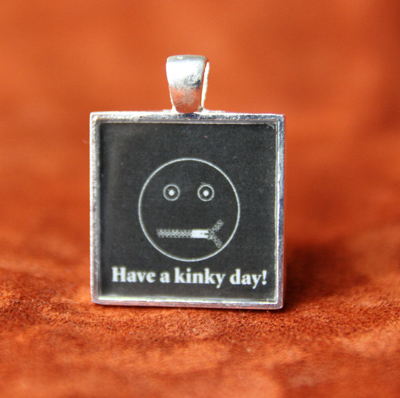 kinky day keychain pendant